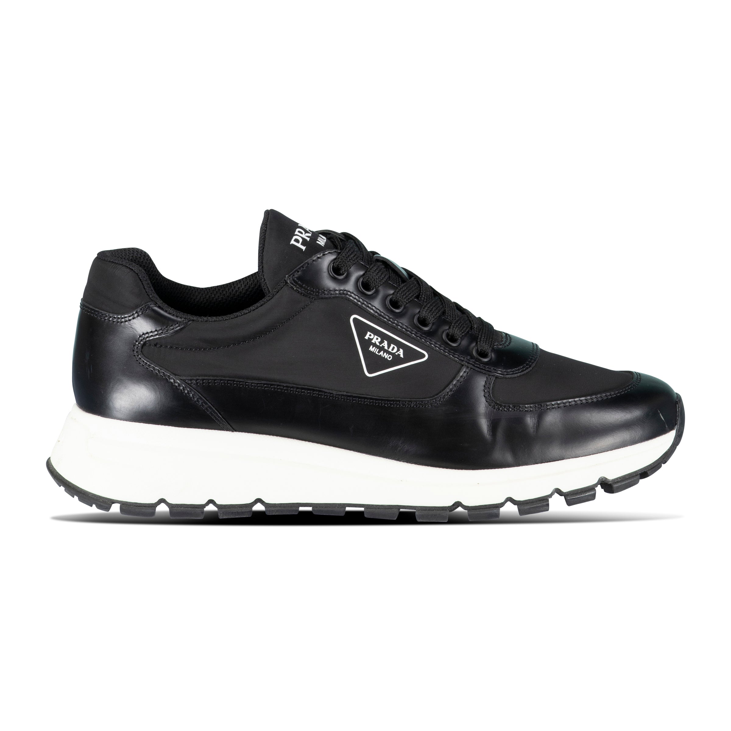PRADA BLACK LOGO TRAINER - UK 6 (Fit 7) - Affluent ArchivesUsed HIGH END DESIGNER CLOTHING
