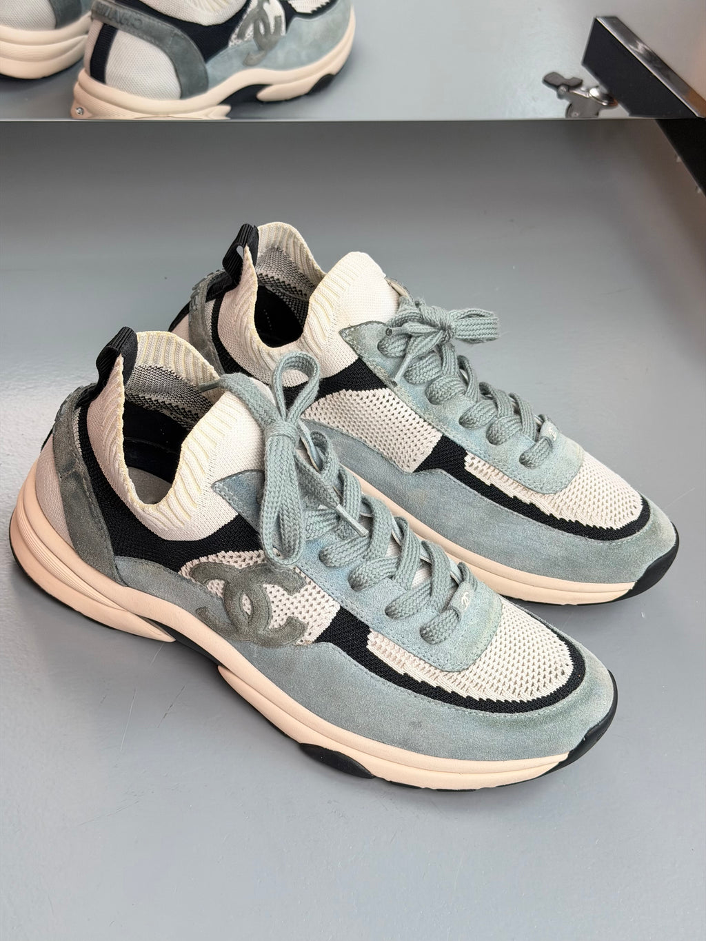 CHANEL LIGHT BLUE KNITTED RUNNER TRAINER - UK 10 (44) | PRE OWNED