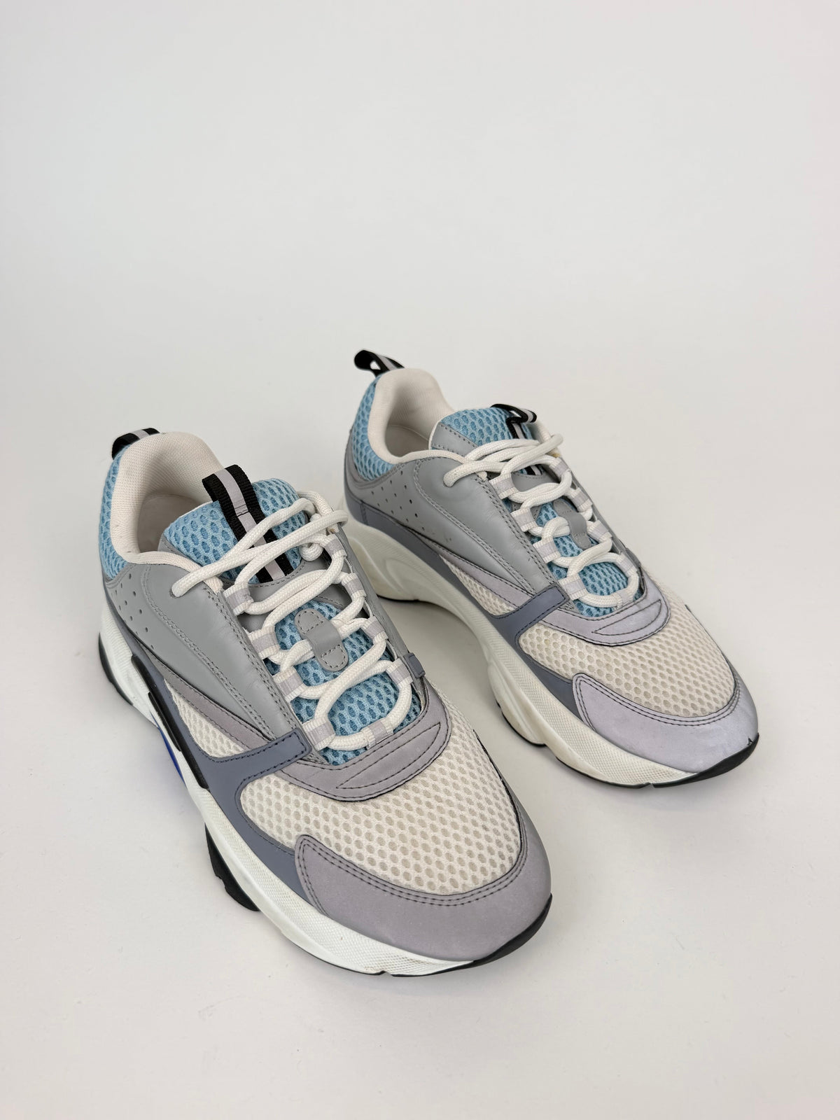 DIOR B22 REFLECTIVE BLUE / WHITE - UK 6 (40) | PRE OWNED - Affluent ArchivesUsed HIGH END DESIGNER CLOTHING