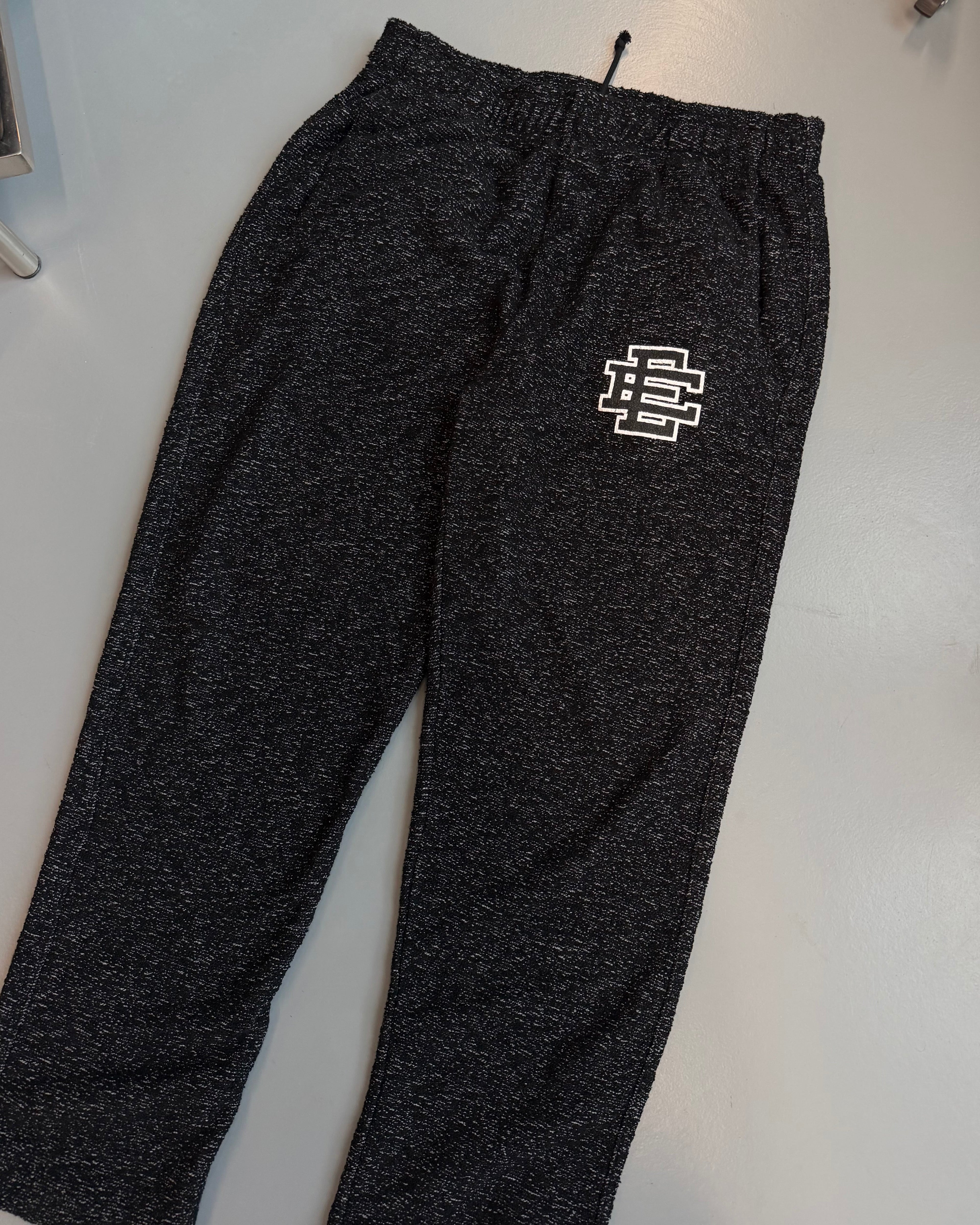 ERIC EMANUEL BLACK BOUCLE TRACK PANTS - XL | PRE OWNED - Affluent ArchivesUsed HIGH END DESIGNER CLOTHING