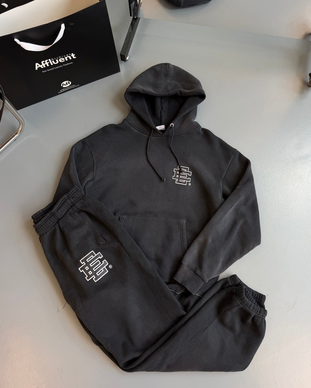ERIC EMANUEL BLACK WASHED FULL TRACKSUIT - LARGE & XL | PRE OWNED - Affluent ArchivesUsed HIGH END DESIGNER CLOTHING