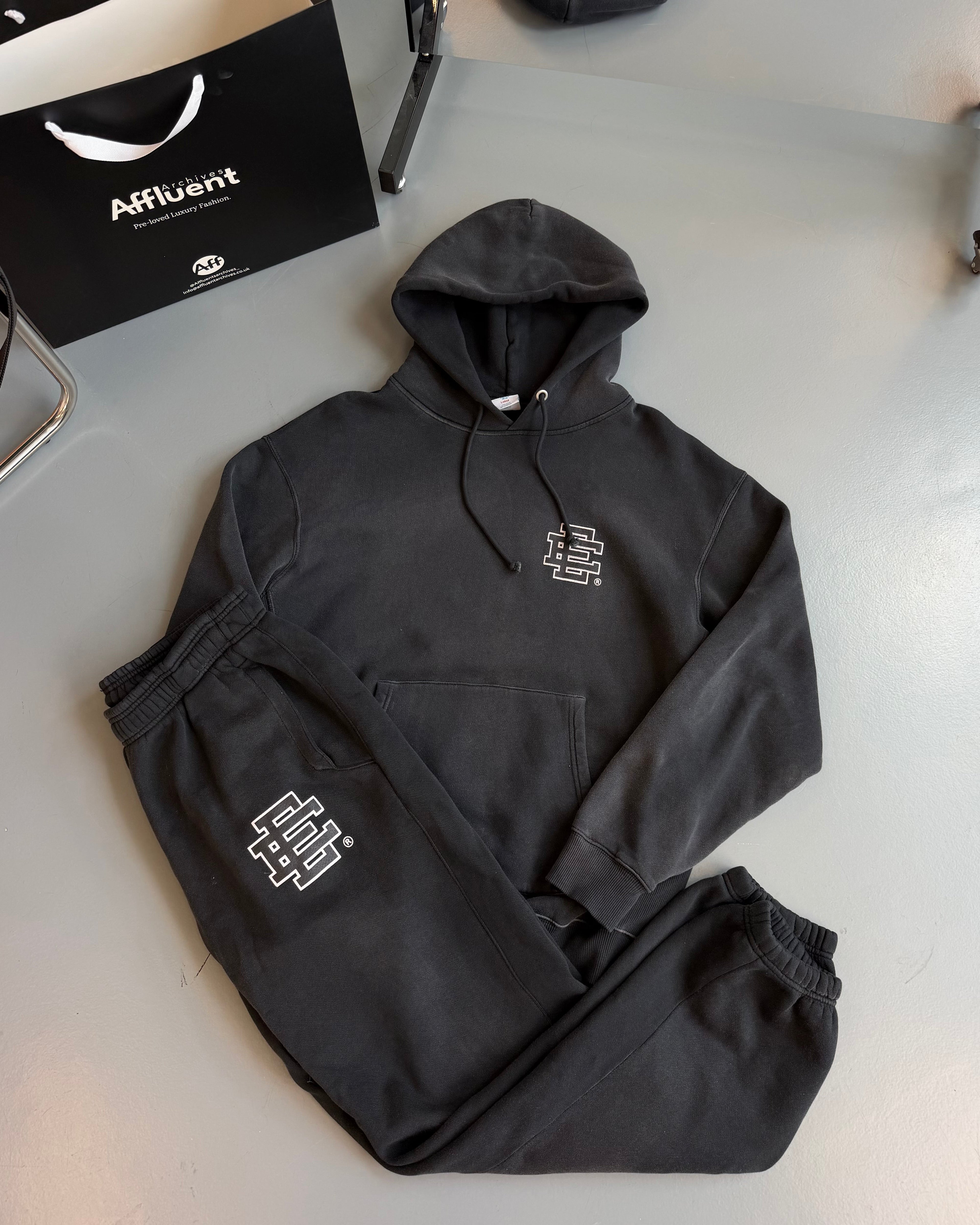 ERIC EMANUEL BLACK WASHED FULL TRACKSUIT - LARGE & XL | PRE OWNED - Affluent ArchivesUsed HIGH END DESIGNER CLOTHING