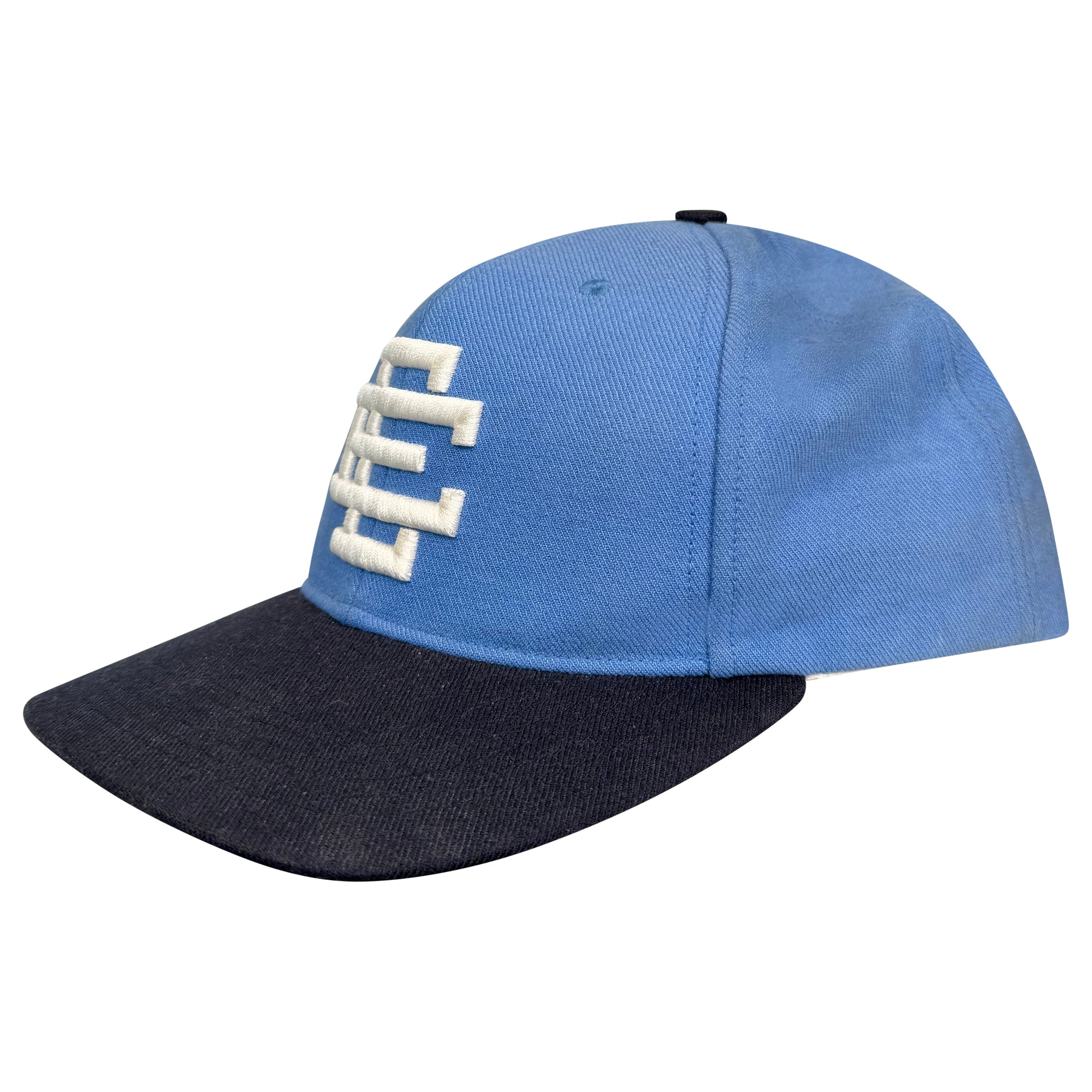 ERIC EMANUEL BLUETRUCKER CAP | PRE OWNED - Affluent ArchivesUsed HIGH END DESIGNER CLOTHING