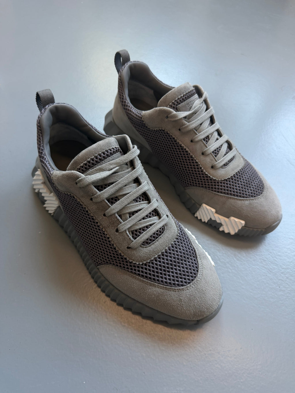 HERMES BOUNCING GREY TRAINER - UK 7.5 (Fits 8) - Affluent ArchivesUsed HIGH END DESIGNER CLOTHING