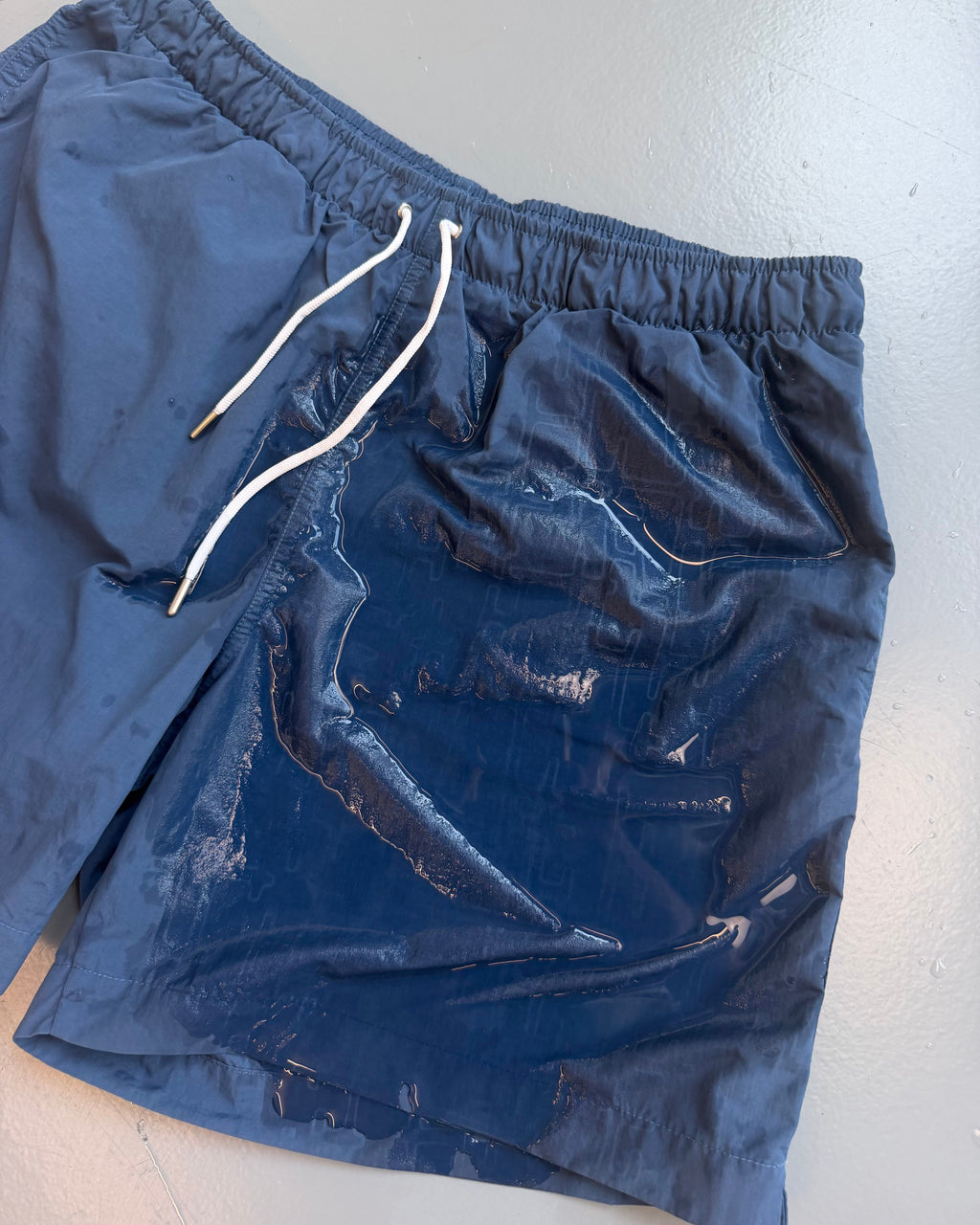 HERMES NAVY "H FANTOME" SWIM SHORTS NAVY - LARGE | PRE OWNED - Affluent ArchivesUsed HIGH END DESIGNER CLOTHING