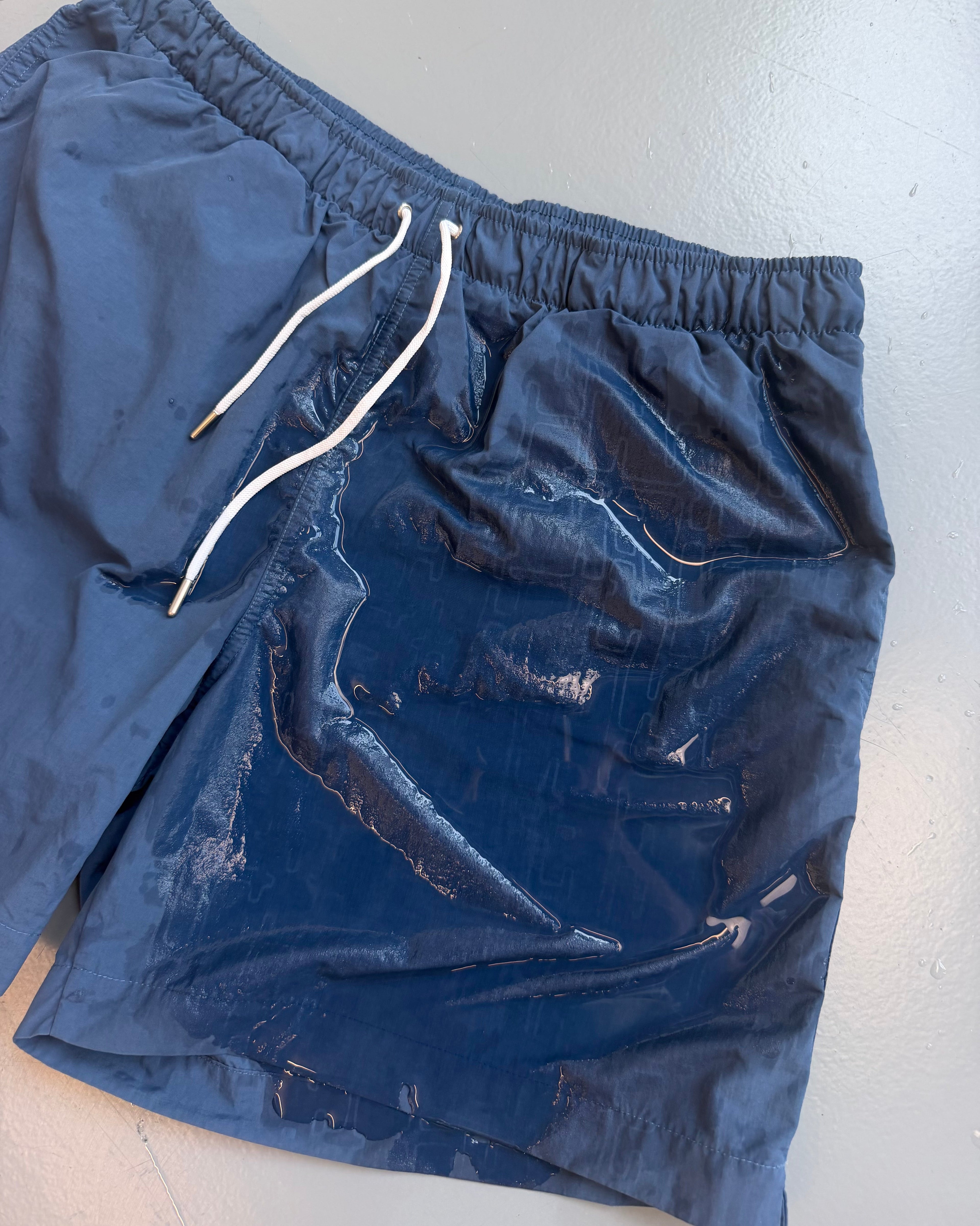 HERMES NAVY "H FANTOME" SWIM SHORTS NAVY - LARGE | PRE OWNED - Affluent ArchivesUsed HIGH END DESIGNER CLOTHING
