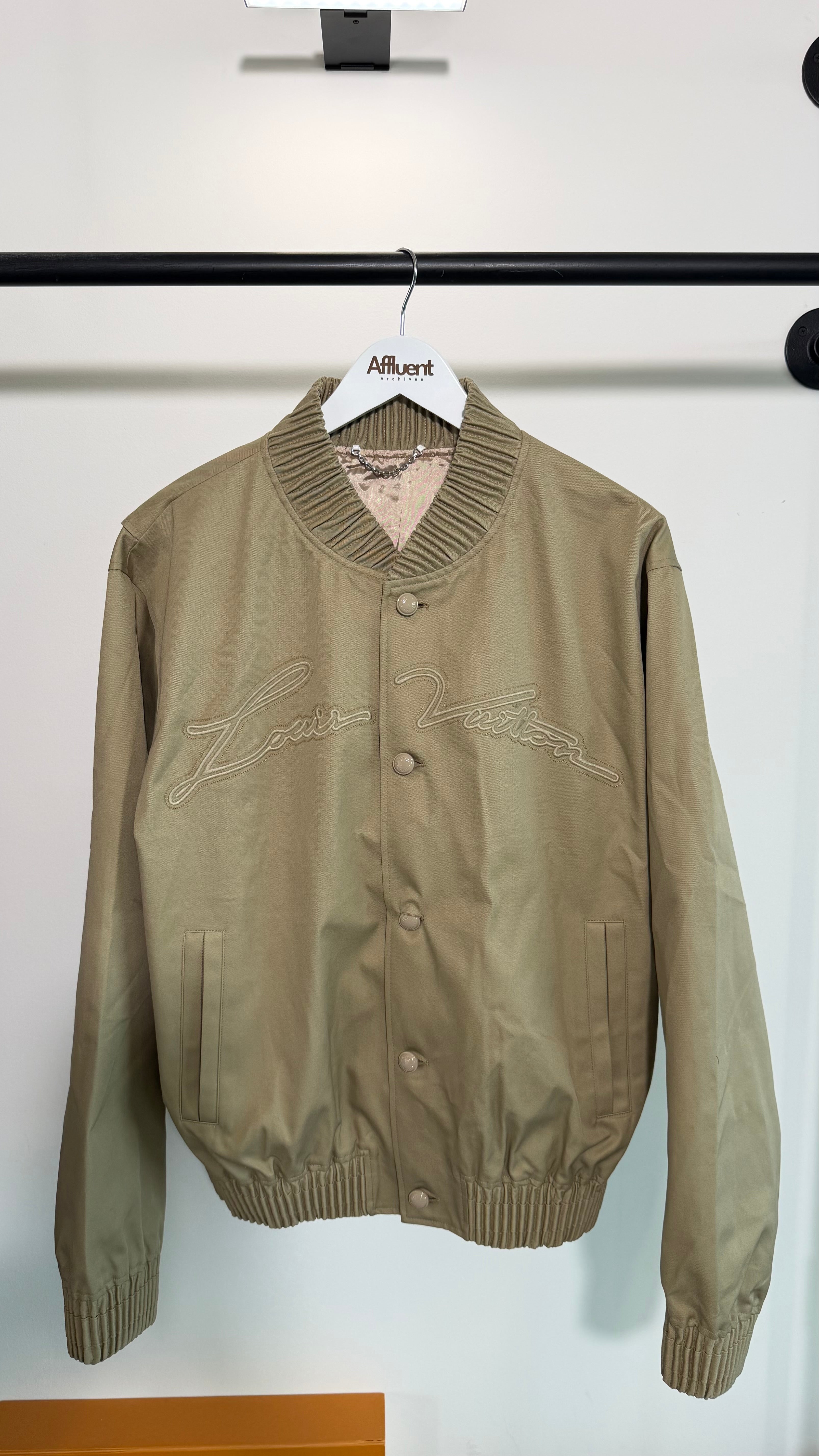 LOUIS VUITTON BEIGE VARSITY BOMBER JACKET - XL (Fits Large) | PRE OWNED - Affluent ArchivesUsed HIGH END DESIGNER CLOTHING