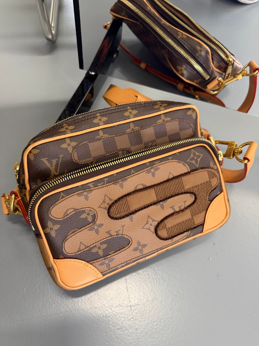 LOUIS VUITTON BROWN NIL CROSS MESSENGER BAG - Affluent ArchivesUsed HIGH END DESIGNER CLOTHING