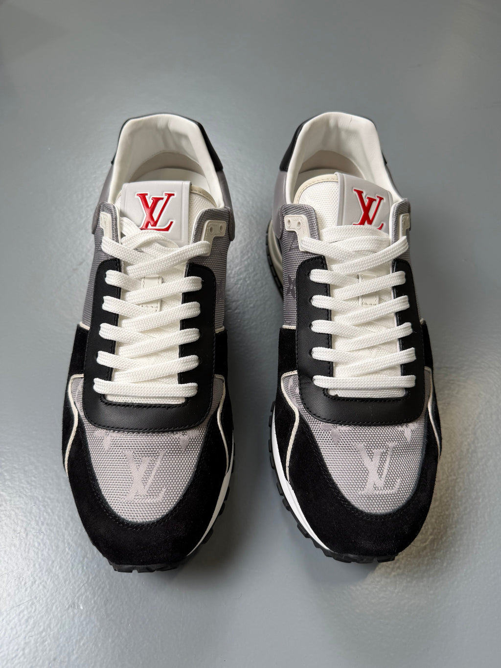 LOUIS VUITTON GREY/BLACK MONOGRAM RUNAWAY TRAINER - UK 6.5 (Fit 7.5) - Affluent ArchivesUsed HIGH END DESIGNER CLOTHING