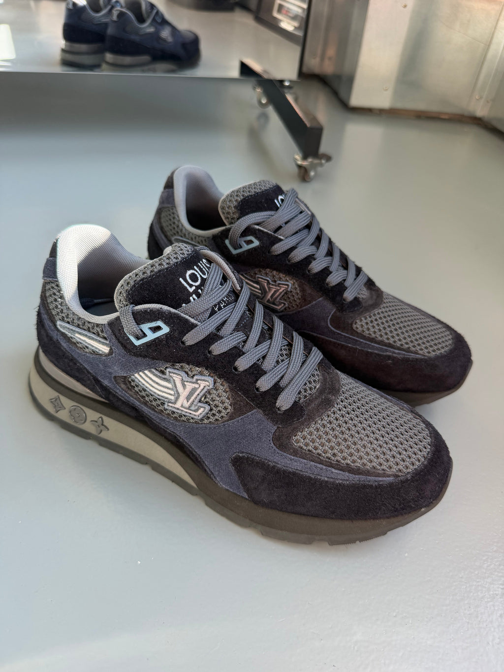 LOUIS VUITTON RUNAWAY TRAINERS NAVY - UK 6 (Fit 7) | PRE OWNED - Affluent ArchivesUsed HIGH END DESIGNER CLOTHING