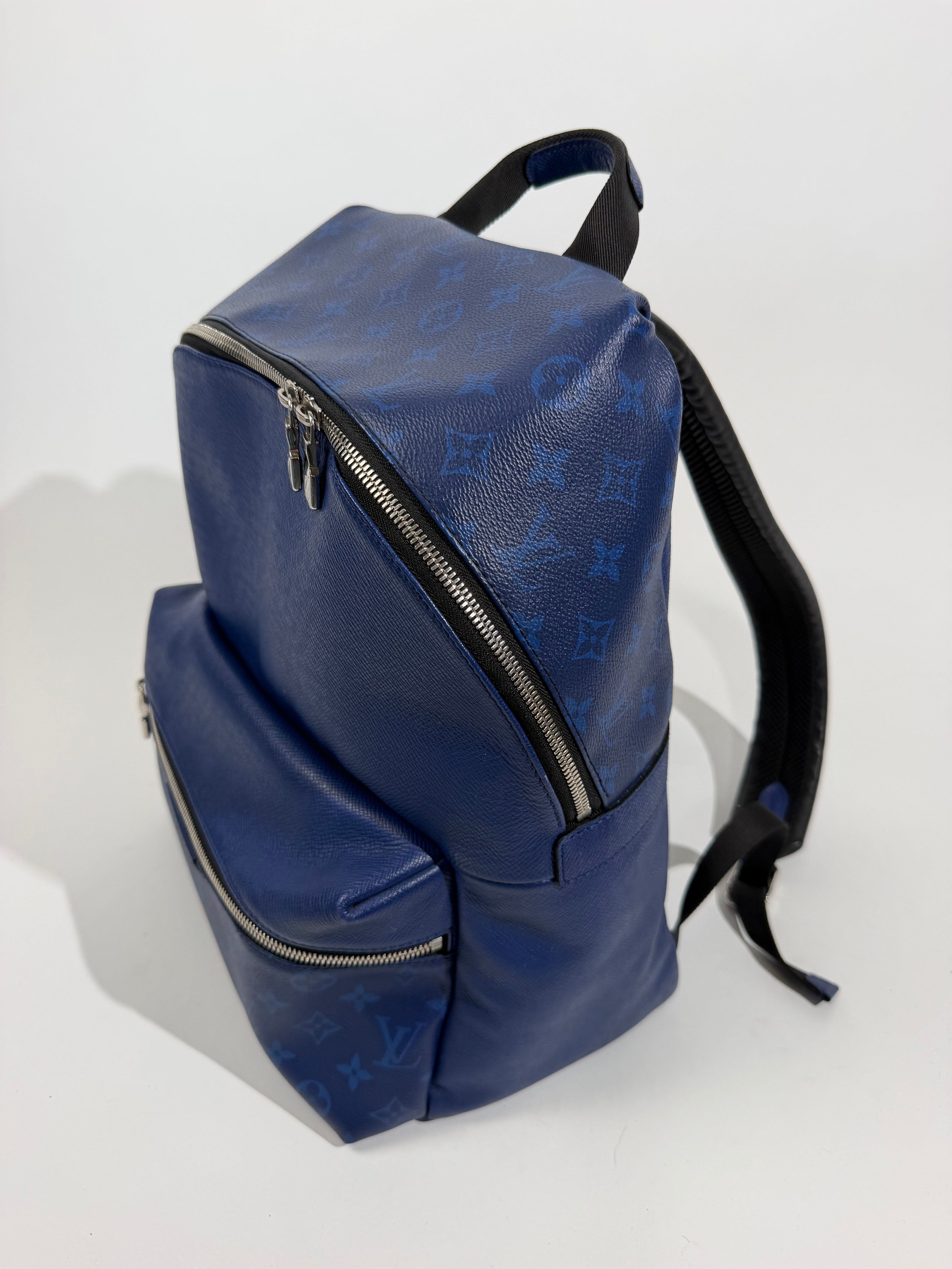 LOUIS VUITTON TAIGARAMA DISCOVERY BACKPACK PM | PRE OWNED - Affluent ArchivesUsed HIGH END DESIGNER CLOTHING