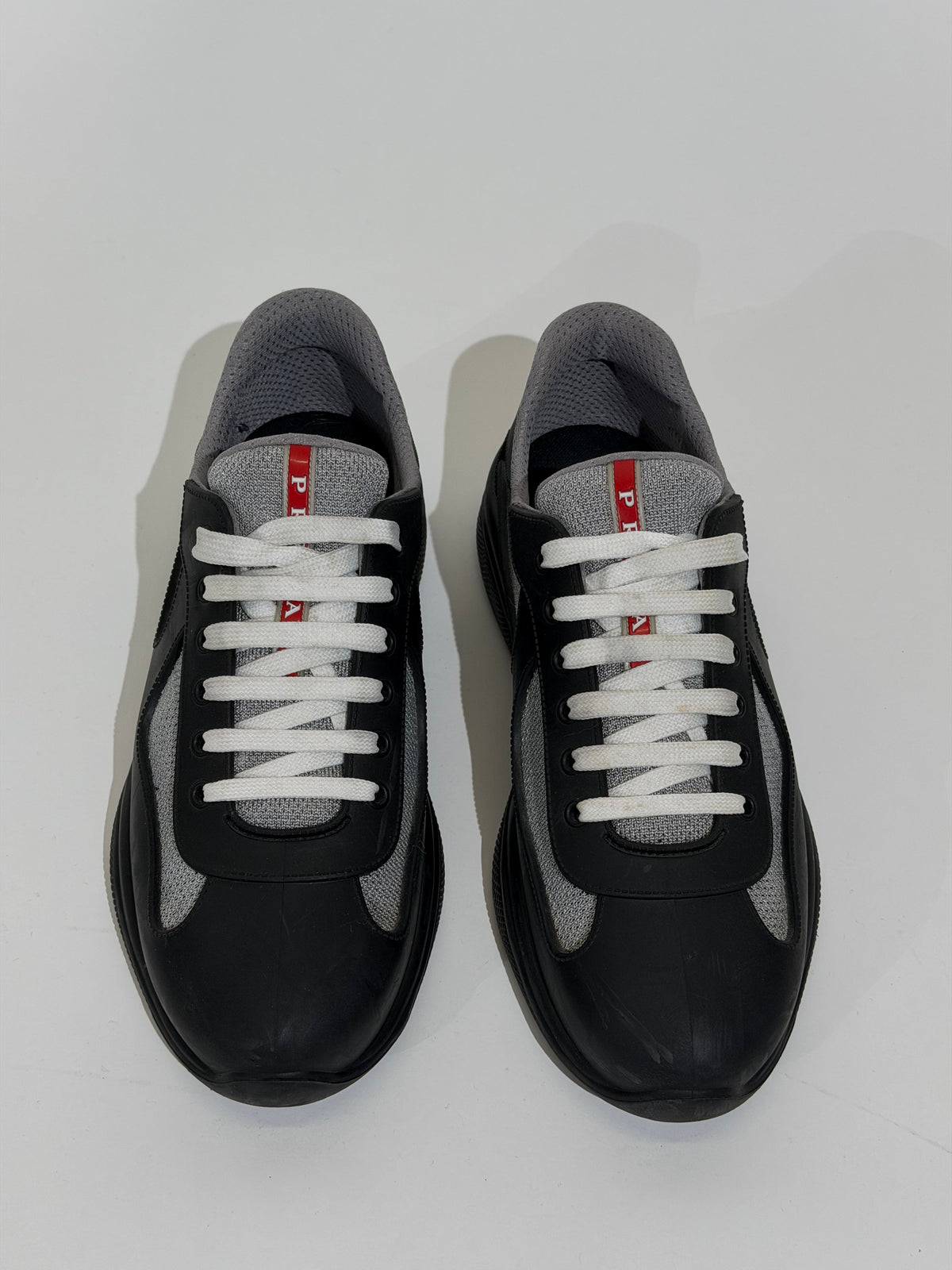PRADA AMERICA CUP BLACK - UK 9 (Fits 10) | PRE OWNED - Affluent ArchivesUsed HIGH END DESIGNER CLOTHING