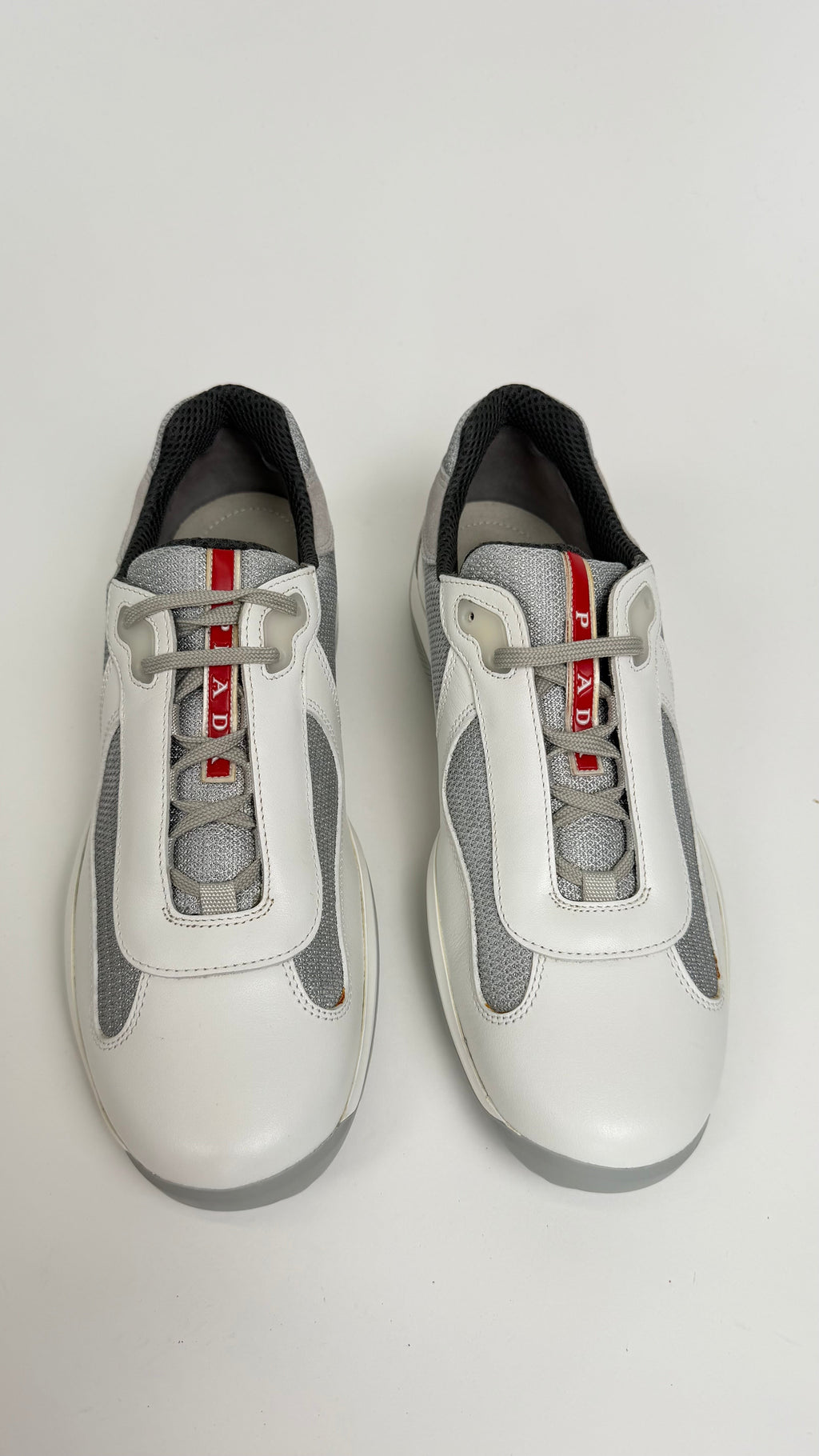 PRADA AMERICAS CUP TRAINERS WHITE - UK 7.5 (Fit 8.5) | NEW - Affluent ArchivesUsed HIGH END DESIGNER CLOTHING