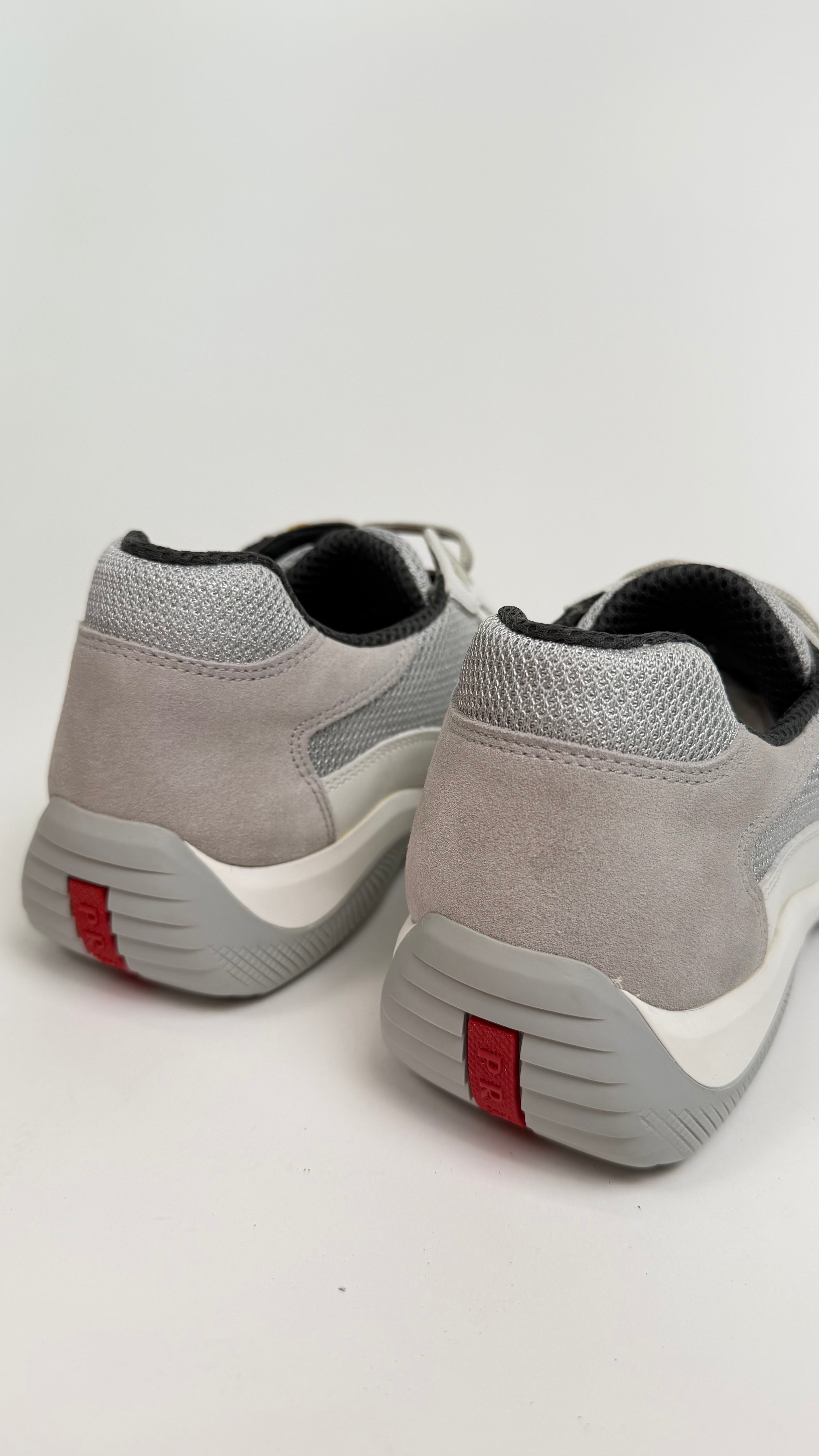 PRADA AMERICAS CUP TRAINERS WHITE - UK 7.5 (Fit 8.5) | NEW - Affluent ArchivesUsed HIGH END DESIGNER CLOTHING