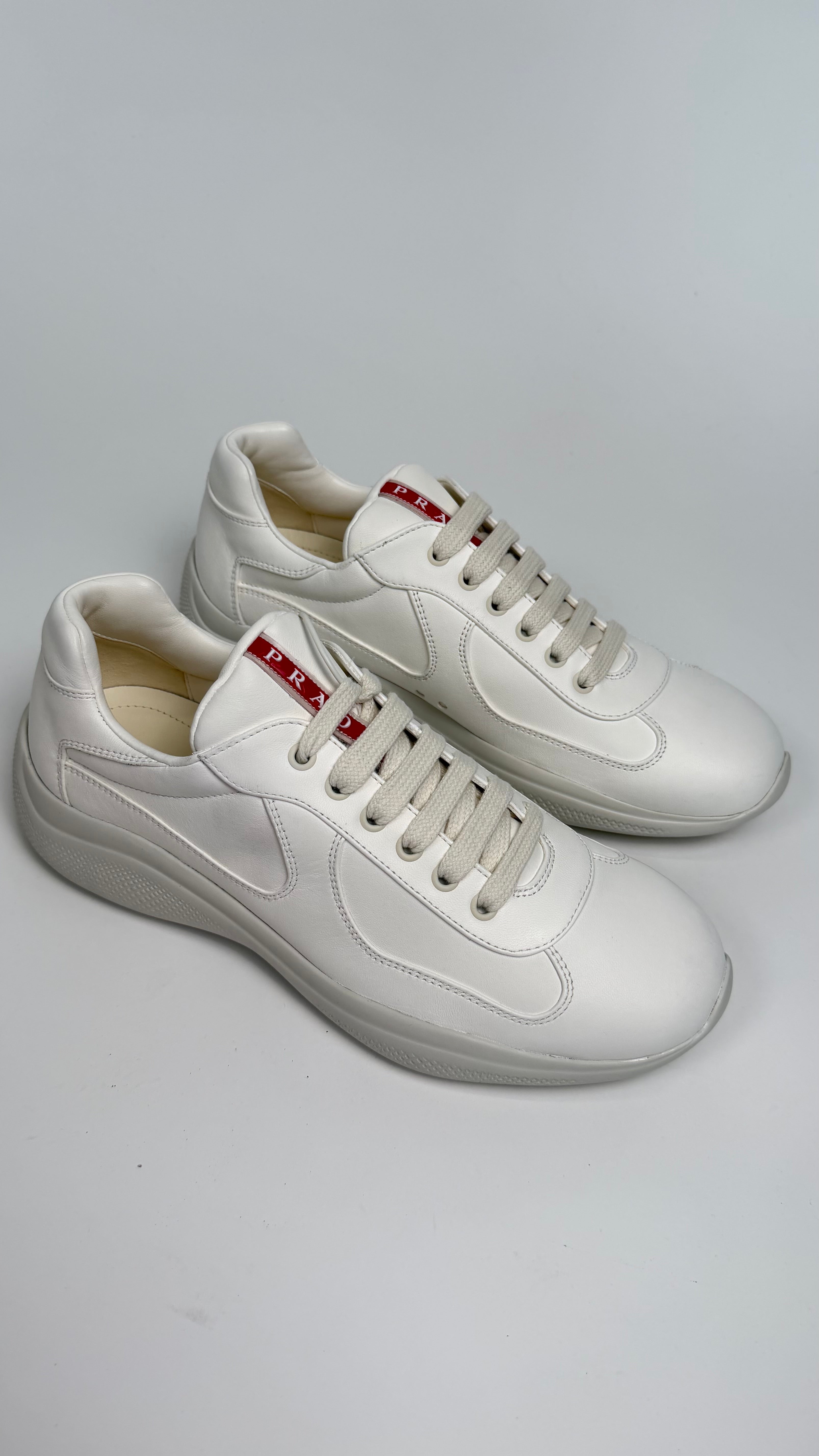 PRADA AMERICAS CUP TRAINERS WHITE - UK 7.5 (Fit 8.5) | NEW - Affluent ArchivesUsed HIGH END DESIGNER CLOTHING