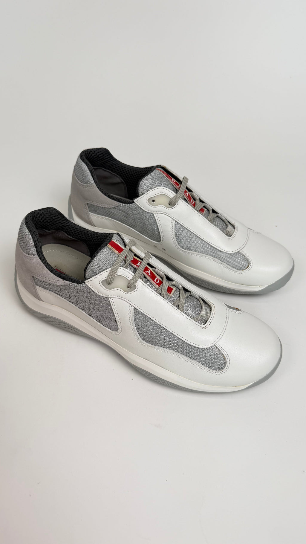 PRADA AMERICAS CUP TRAINERS WHITE - UK 7.5 (Fit 8.5) | NEW - Affluent ArchivesUsed HIGH END DESIGNER CLOTHING