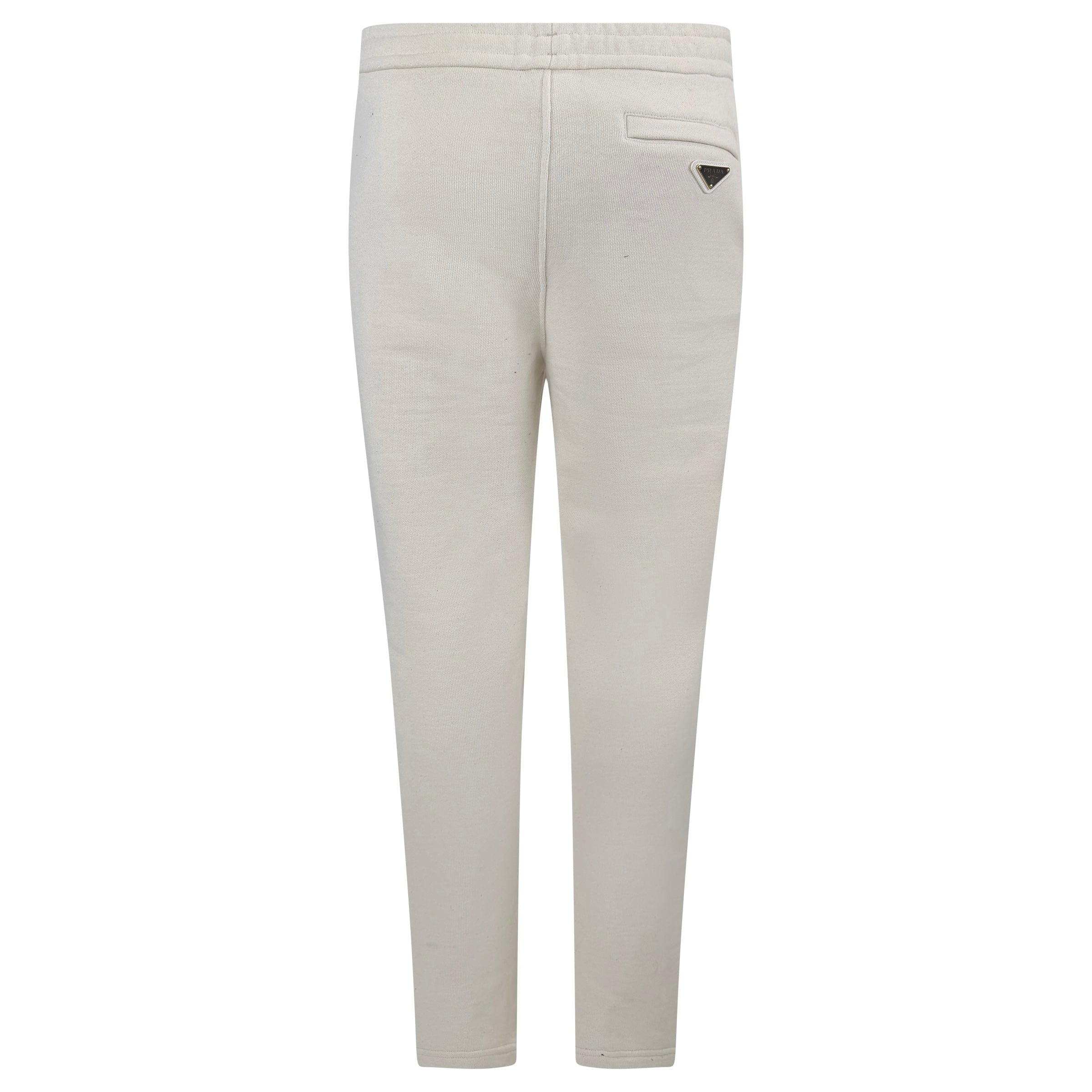 PRADA BEIGE PLAQUE TRACK PANTS - SMALL (Fit Large) - Affluent ArchivesUsed HIGH END DESIGNER CLOTHING