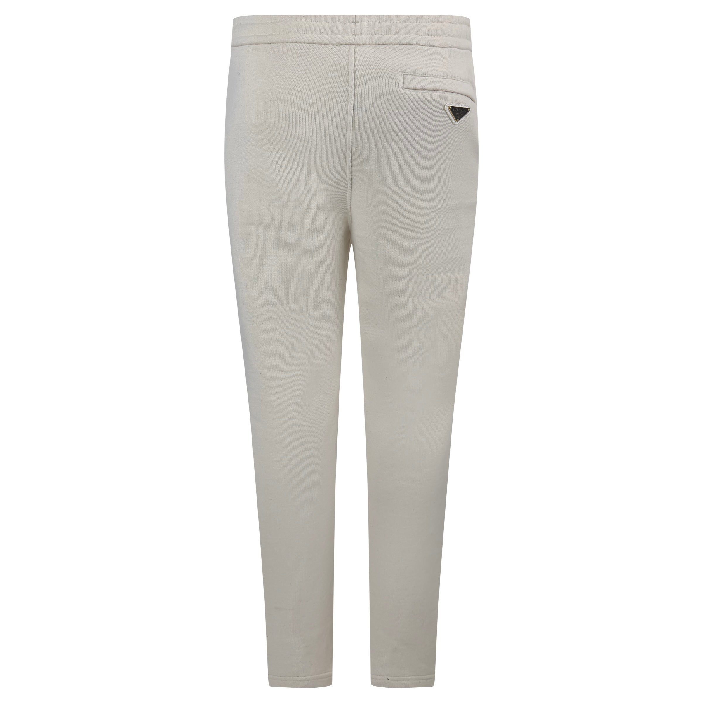 PRADA BEIGE PLAQUE TRACK PANTS - SMALL (Fit Large) - Affluent ArchivesUsed HIGH END DESIGNER CLOTHING