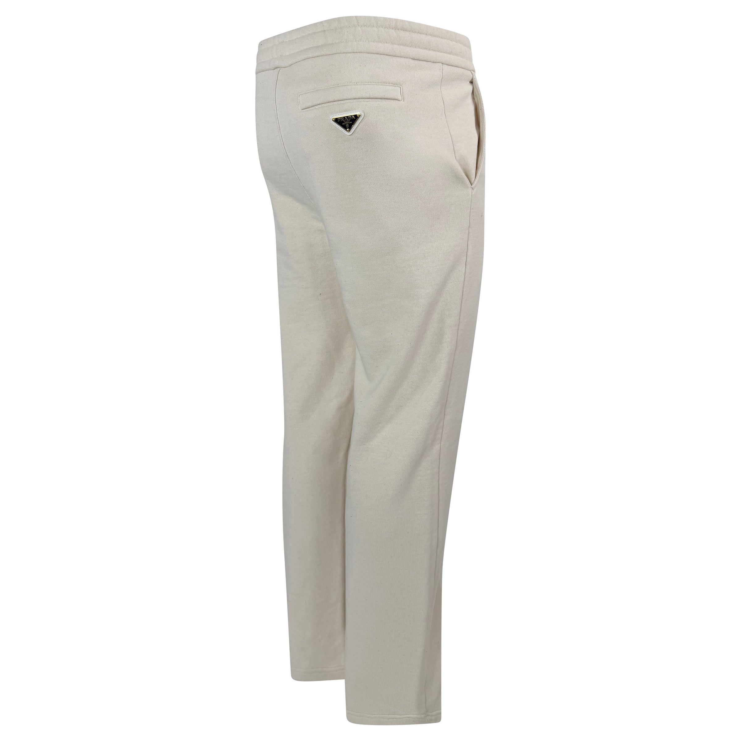 PRADA BEIGE PLAQUE TRACK PANTS - SMALL (Fit Large) - Affluent ArchivesUsed HIGH END DESIGNER CLOTHING