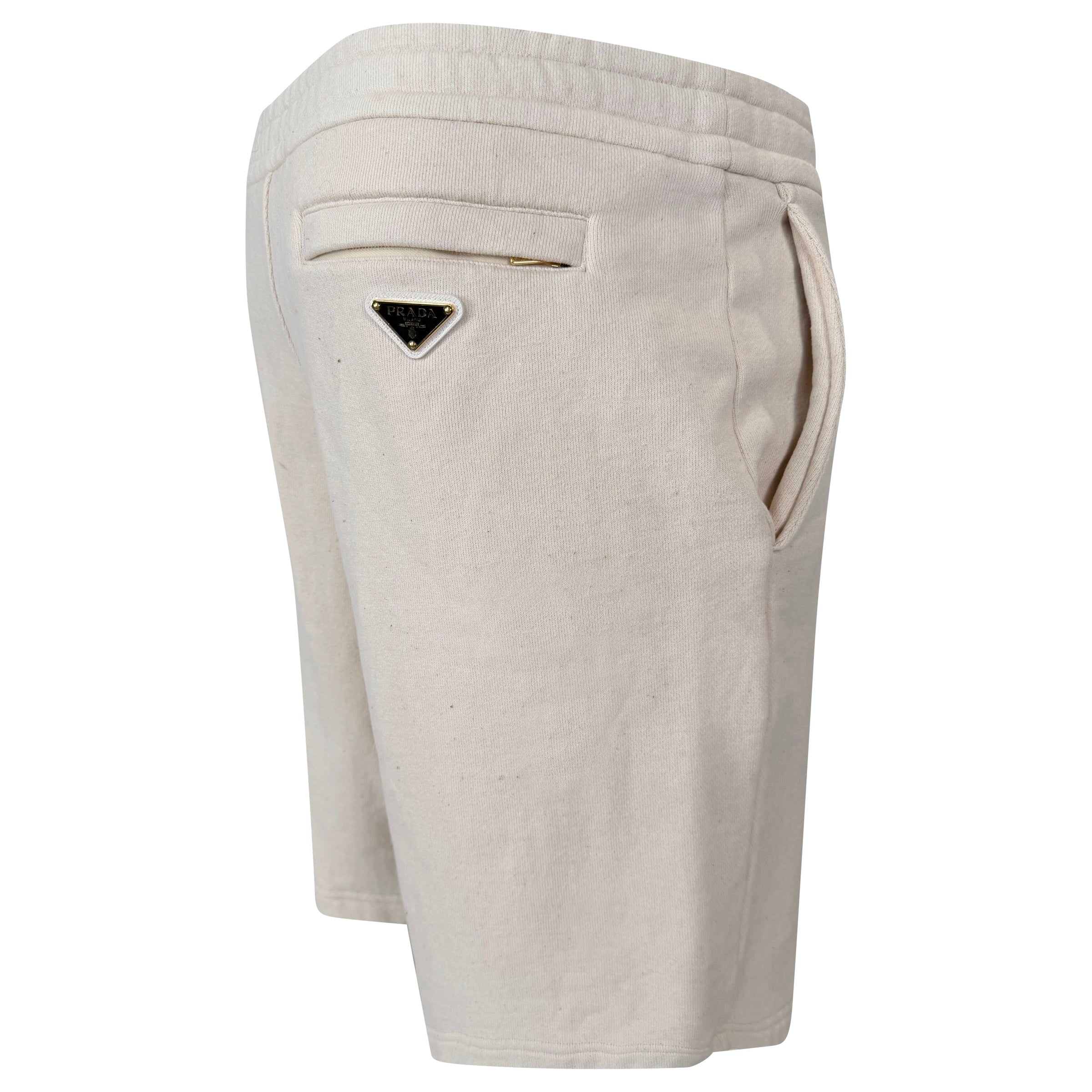 PRADA BEIGE PLAQUE TRACK SHORTS - MEDIUM (Fit Large) - Affluent ArchivesUsed HIGH END DESIGNER CLOTHING