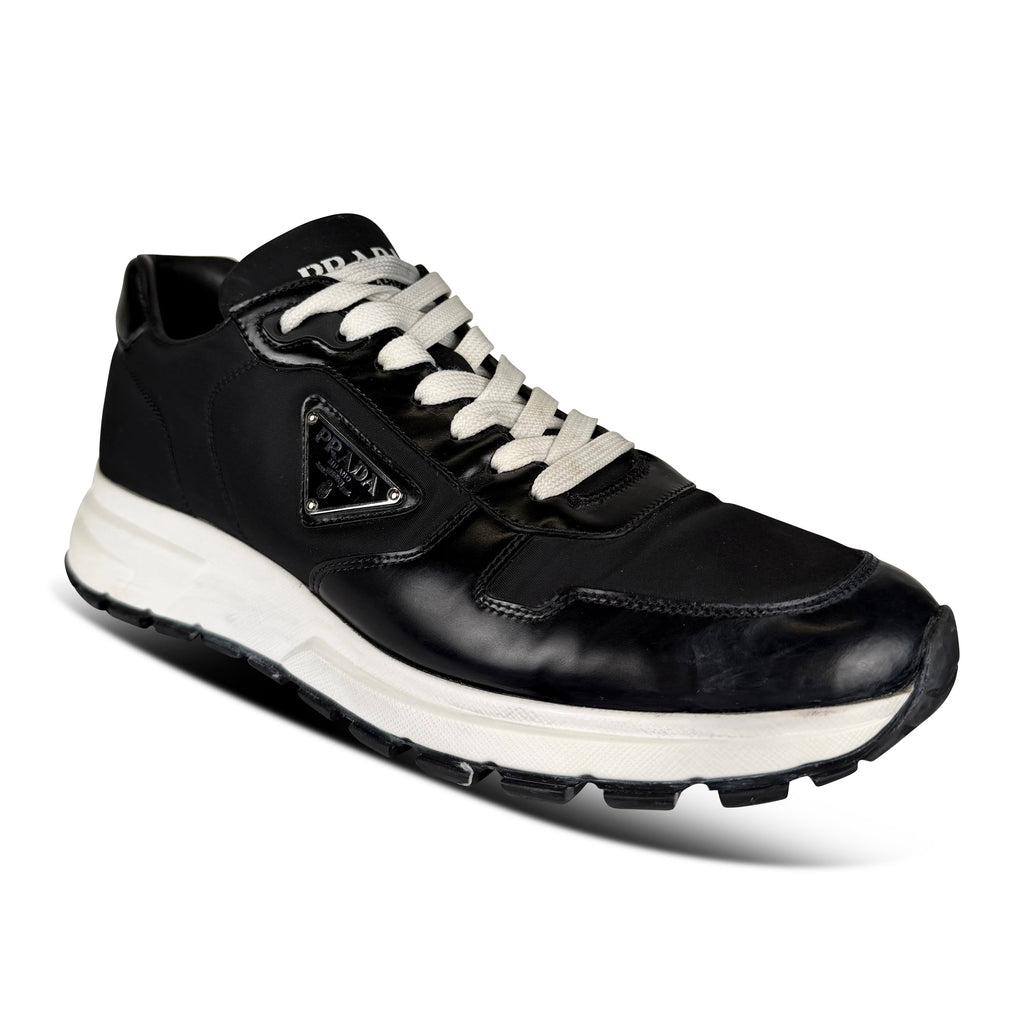 PRADA BLACK LOGO TRAINER - UK 8 (Fit 9) - Affluent ArchivesUsed HIGH END DESIGNER CLOTHING