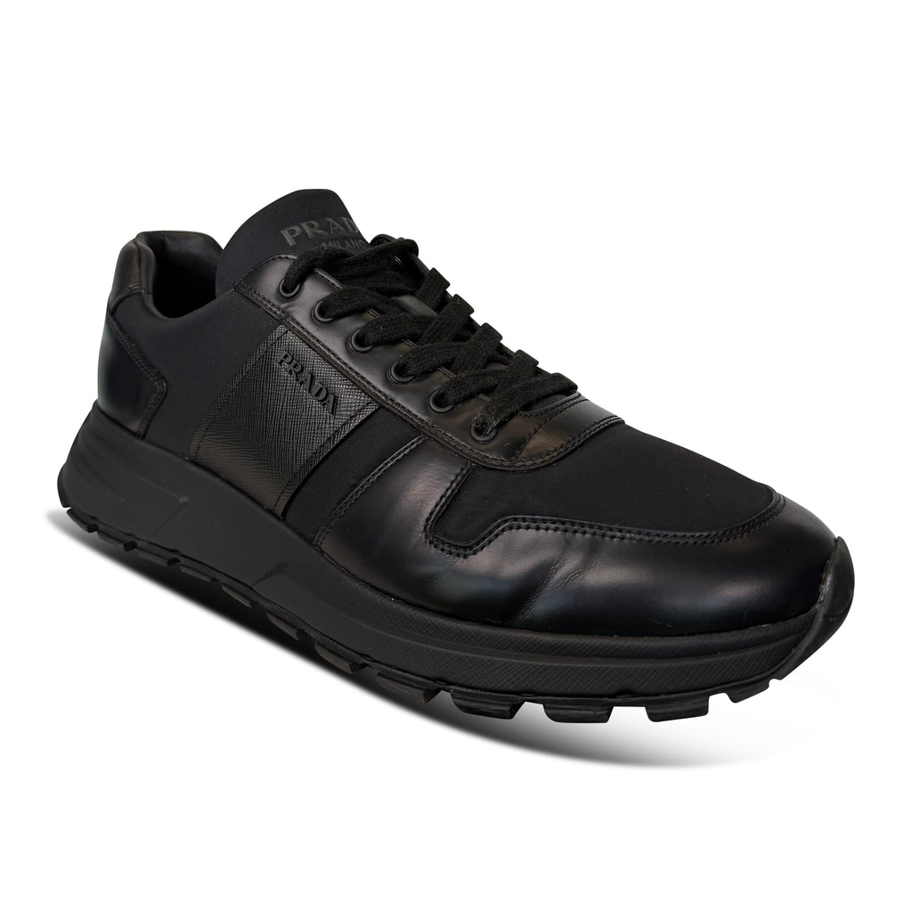 PRADA BLACK LOGO TRAINER - UK 9 (Fits 10) - Affluent ArchivesUsed HIGH END DESIGNER CLOTHING