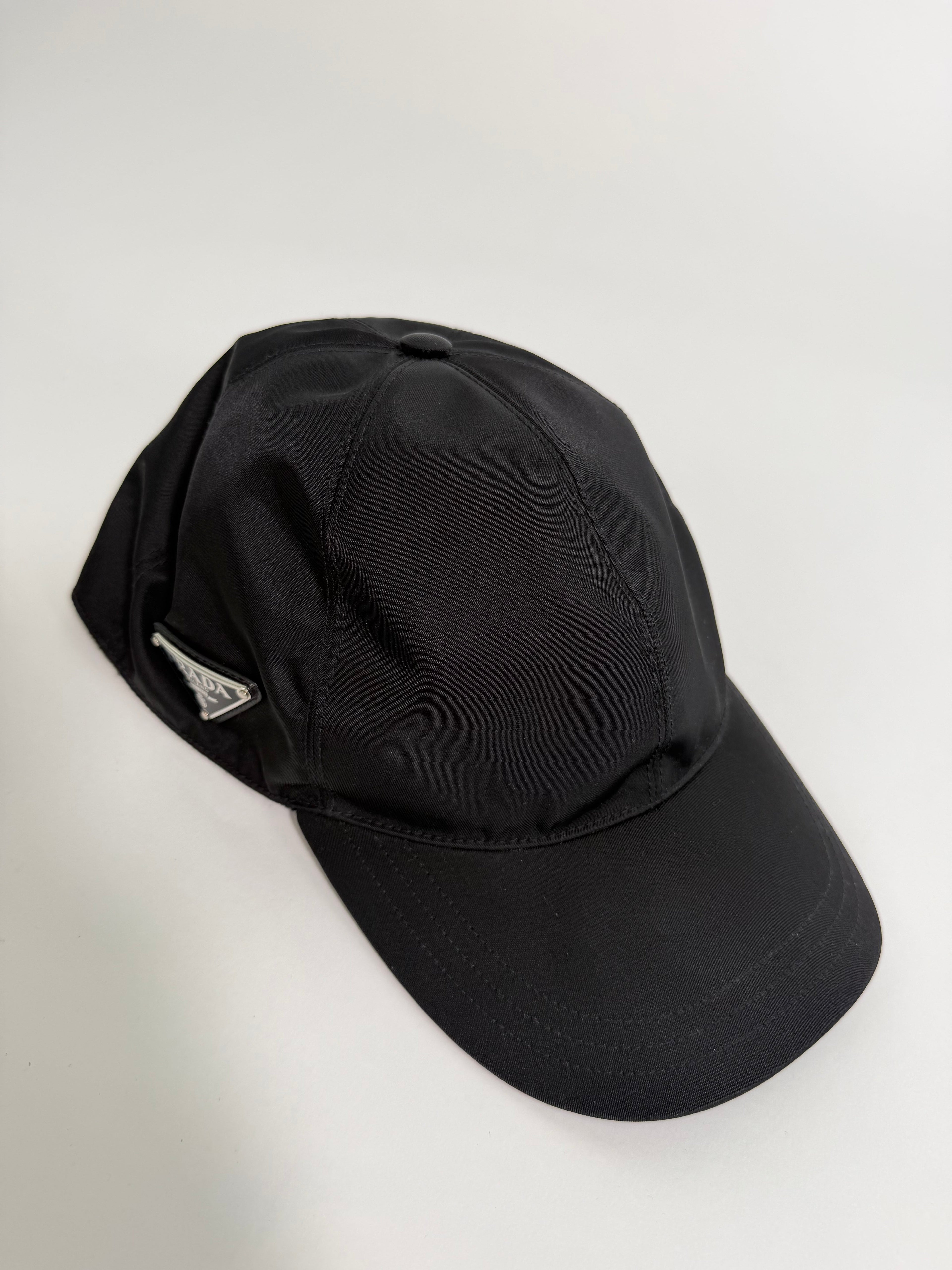 PRADA BLACK NYLON PLAQUE CAP - MEDIUM | PRE OWNED - Affluent ArchivesUsed HIGH END DESIGNER CLOTHING