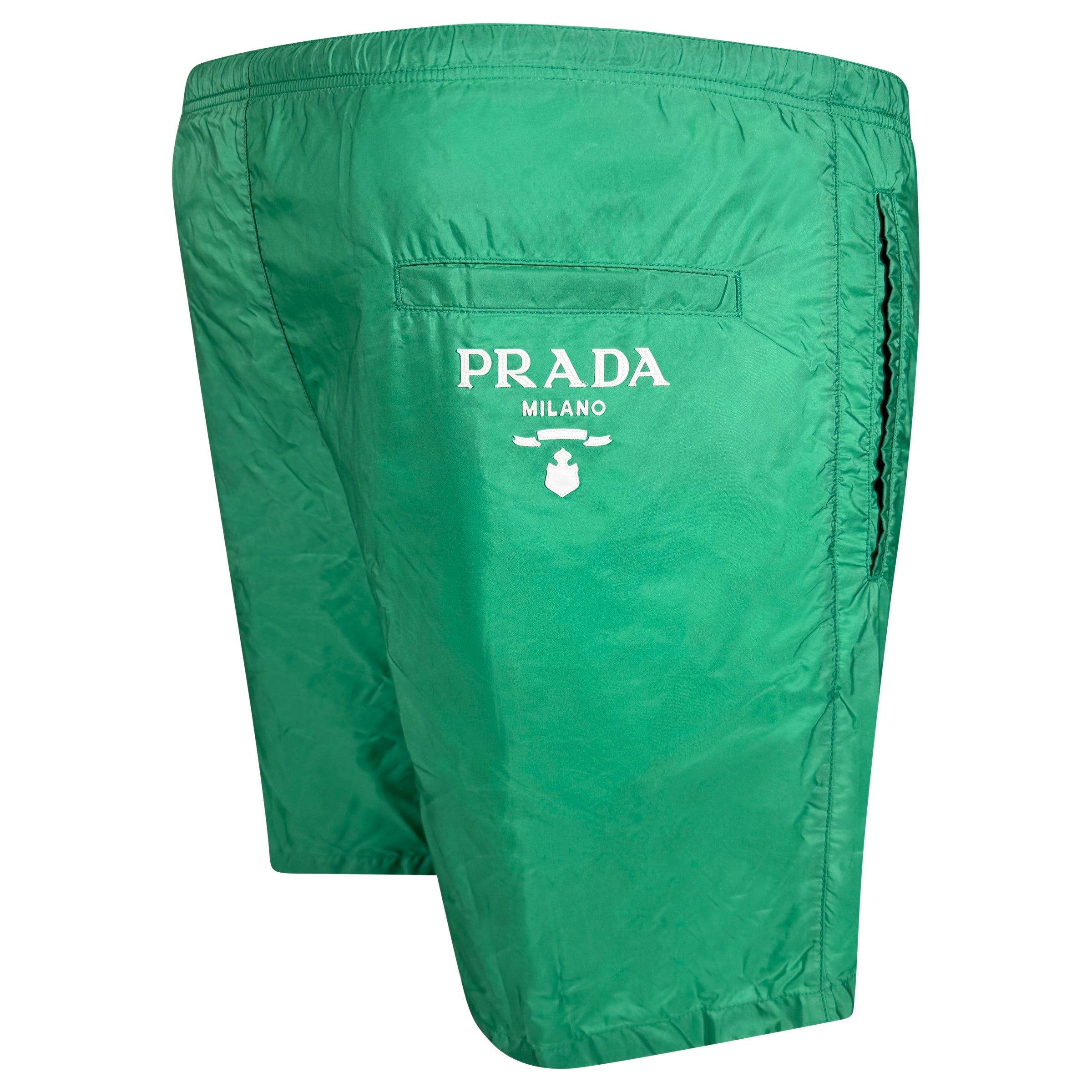 PRADA GREEN LOGO SWIM SHORTS - LARGE (34W) | PRE OWNED - Affluent ArchivesUsed HIGH END DESIGNER CLOTHING