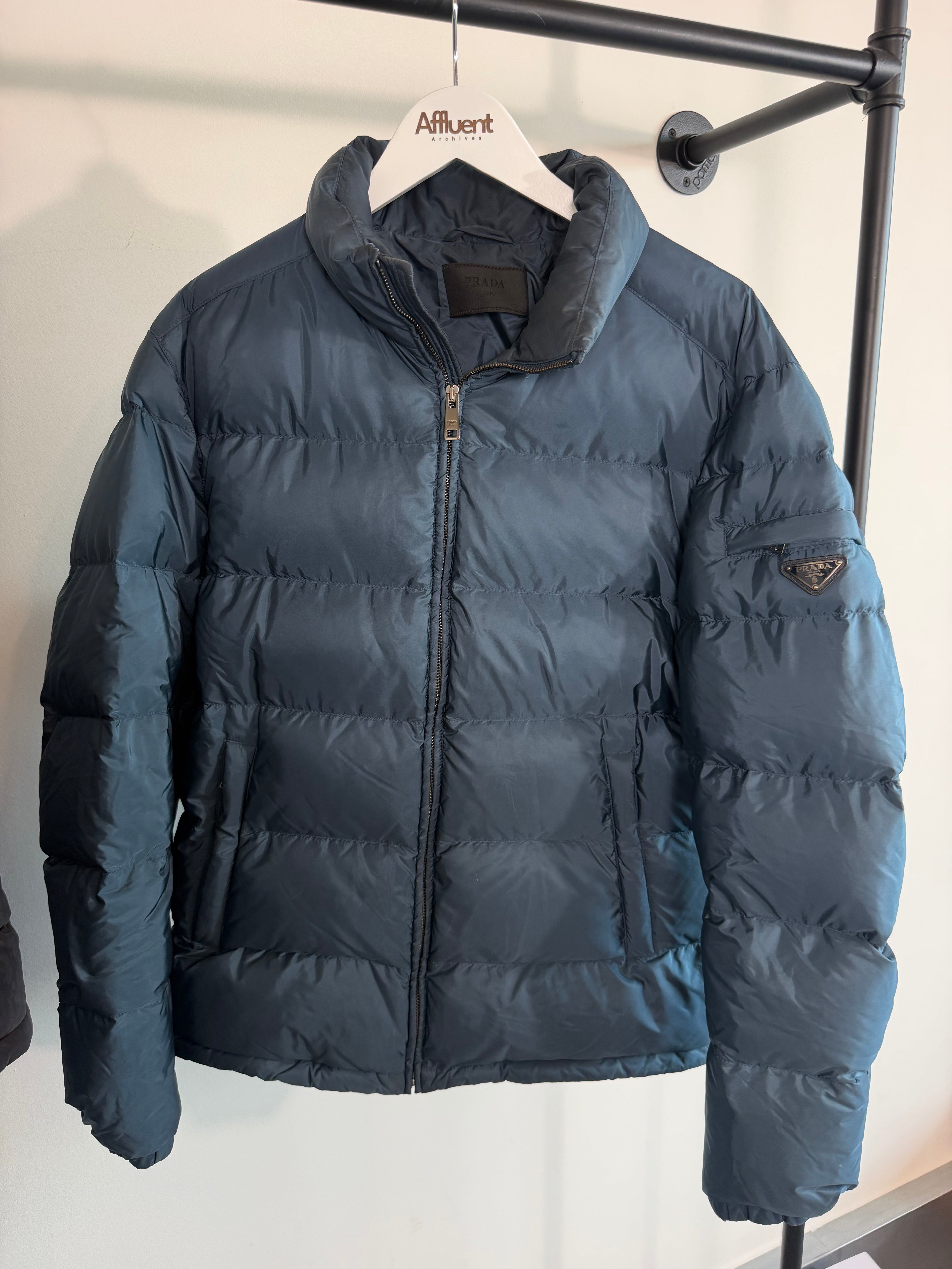 PRADA LIGHT BLUE PUFFER COAT - XL (Fits L) | PRE OWNED - Affluent ArchivesUsed HIGH END DESIGNER CLOTHING