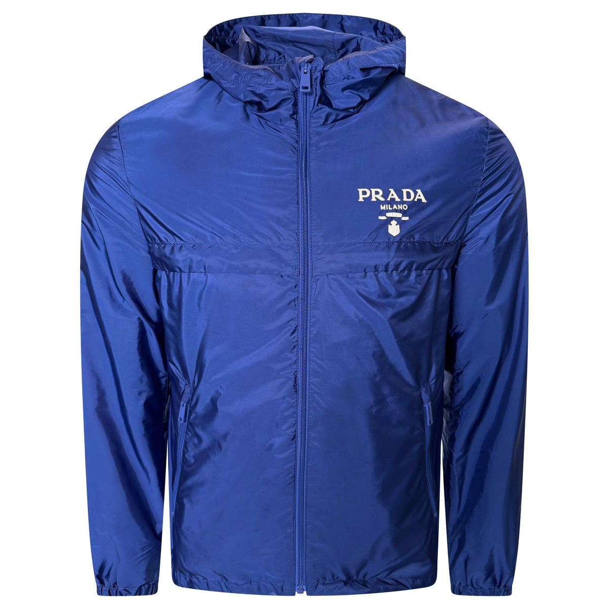 PRADA LOGO BLUE WINDBREAKER - MEDIUM (48) | PRE OWNED - Affluent ArchivesUsed HIGH END DESIGNER CLOTHING