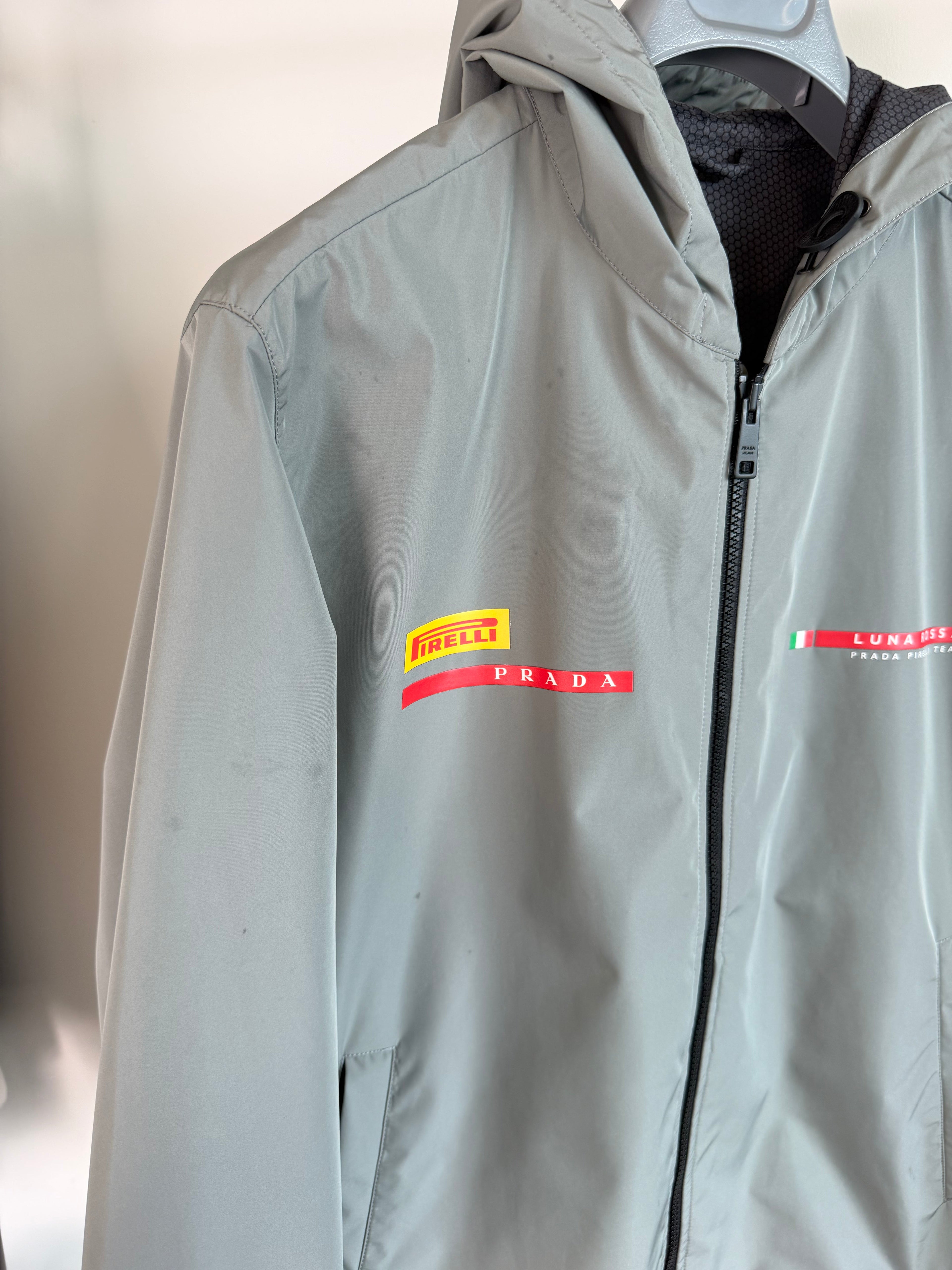 PRADA LUNA ROSSA GREY GORTEX JACKET - XXL (Fits XL) | PRE OWNED - Affluent ArchivesUsed HIGH END DESIGNER CLOTHING